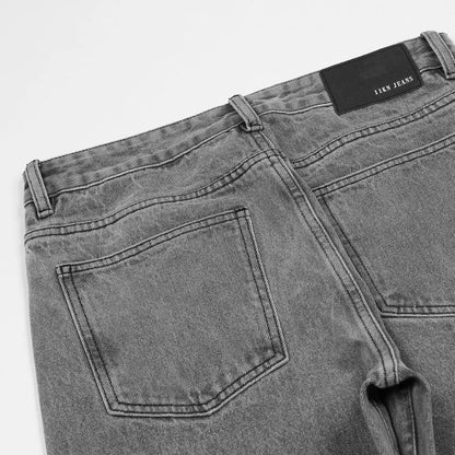 Męskie spodnie ze spranego dżinsu